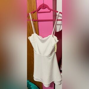 NWT. White spaghetti strap dress. Brand is Speechless. Size M.